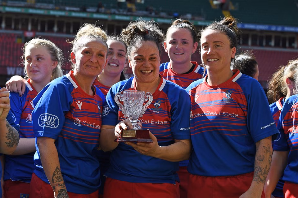 Senghenydd Women celebrate lifting the trophy at full time