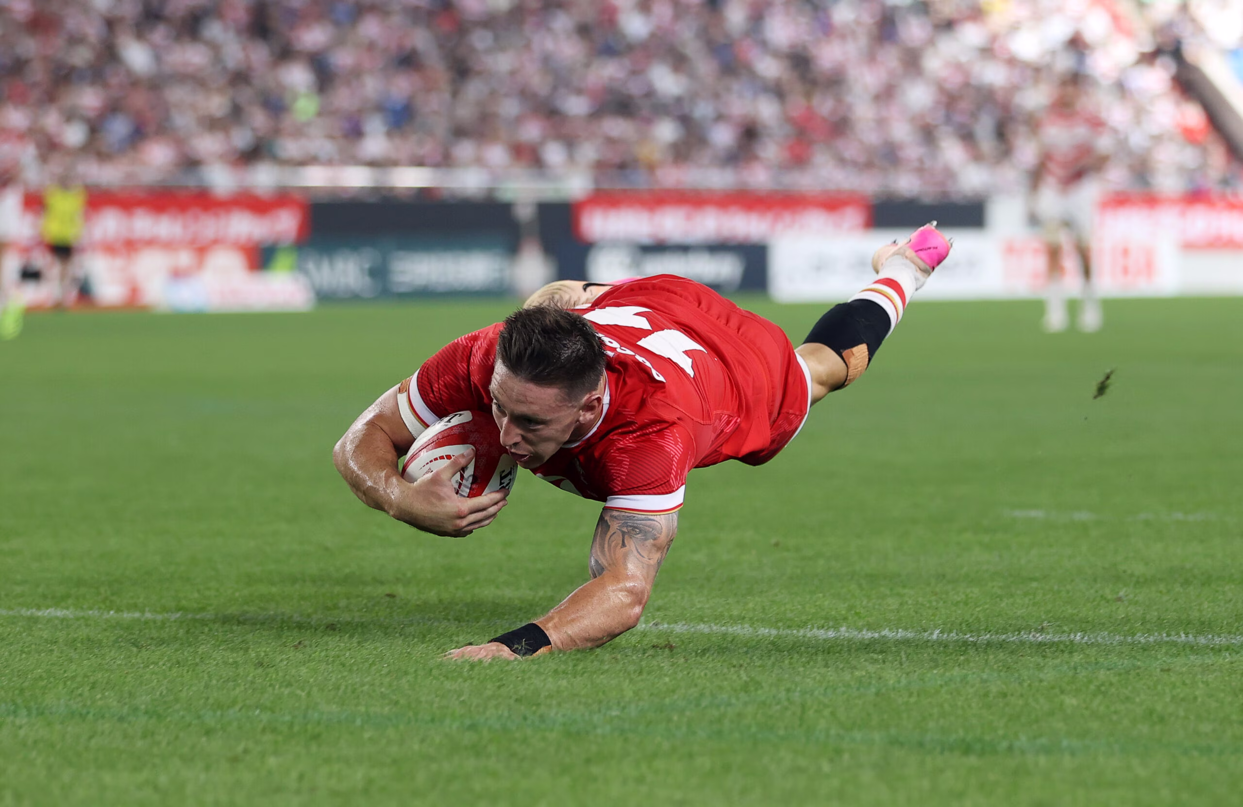 Josh Adams scores for Wales