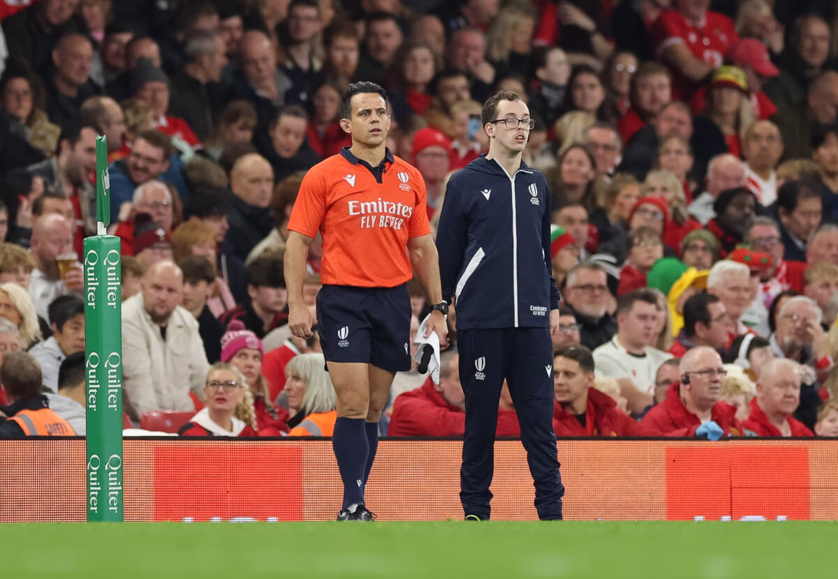 Assistant Match Official Evan Jenkins keeps an eye on proceedings
