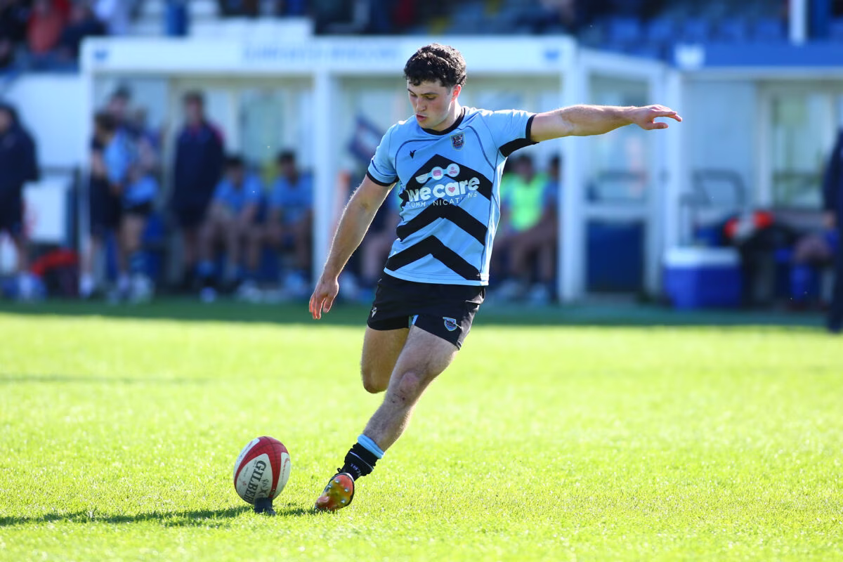 Harri Wilde of Cardiff kicks a goal