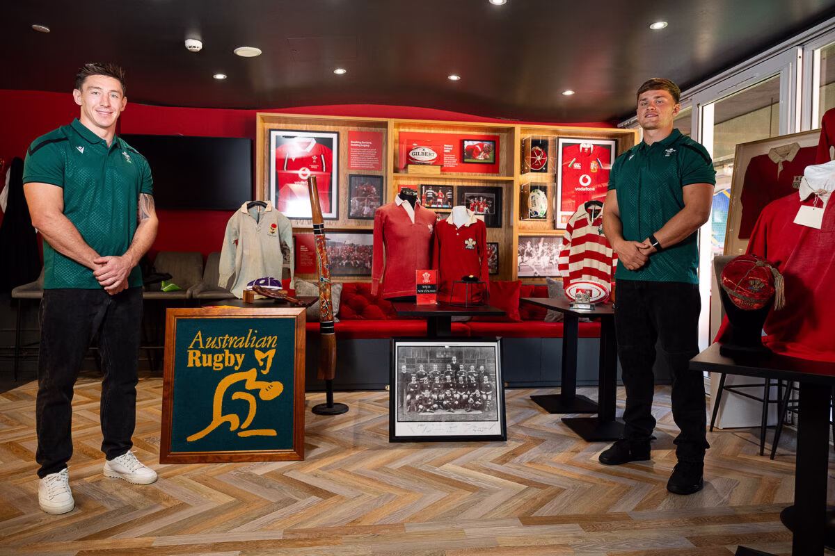 CDF_300926_KA_National_Sporting_Heritage_Day_WRU_002 Josh Adams and Alex Mann pictured with a selection of the unique items from the WRU archive